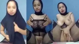 Lusi Berjilbab Hitam Menggairahkan, Basah Dan Berdesah Saat Memuaskan Diri